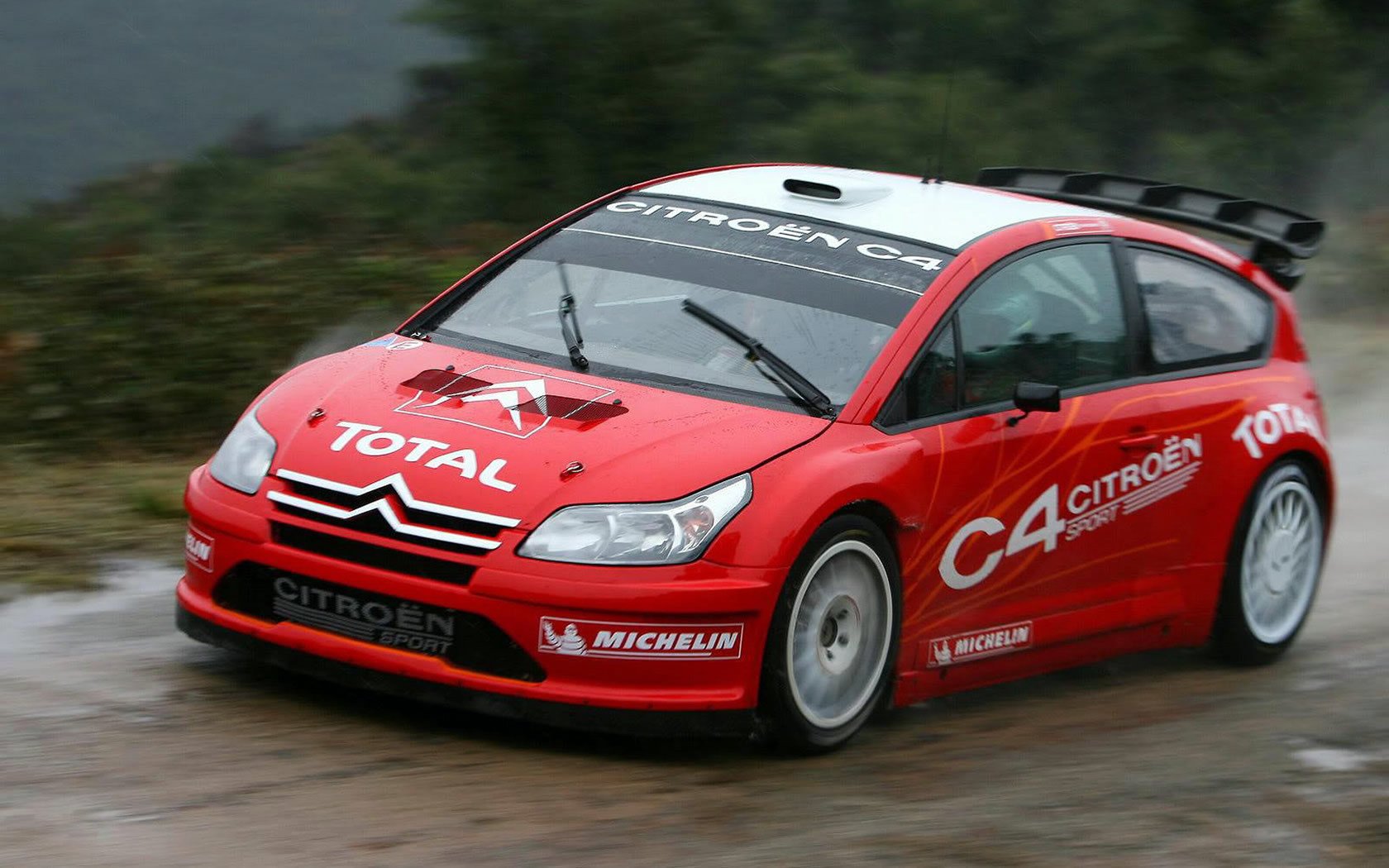 líder sibastian loeb tiempo lluvioso citroen c4 wrc rally velocidad tráfico coche rojo letras coches vehículos auto vehículos