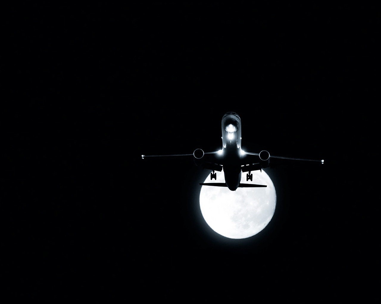 flugzeug mond nacht