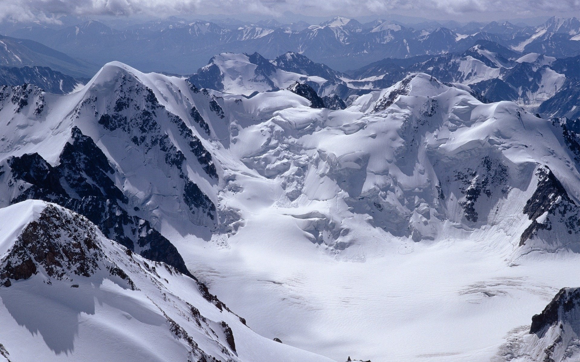 now-capped mountains impassable snow view mountains snow winter