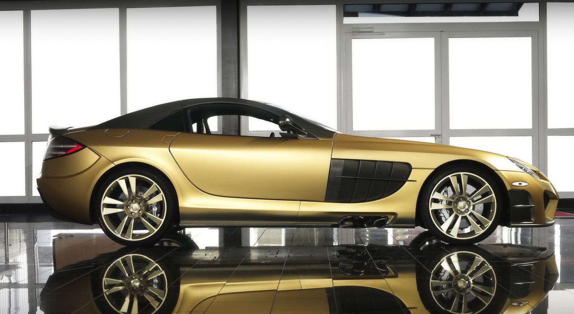 mansory mercedes-benz mclaren slr renovatio perfezione d oro potenza sotto il cofano arte dell aerodinamica auto profilo mercedes oro stile design lusso autovetture automobili trasporti veicoli