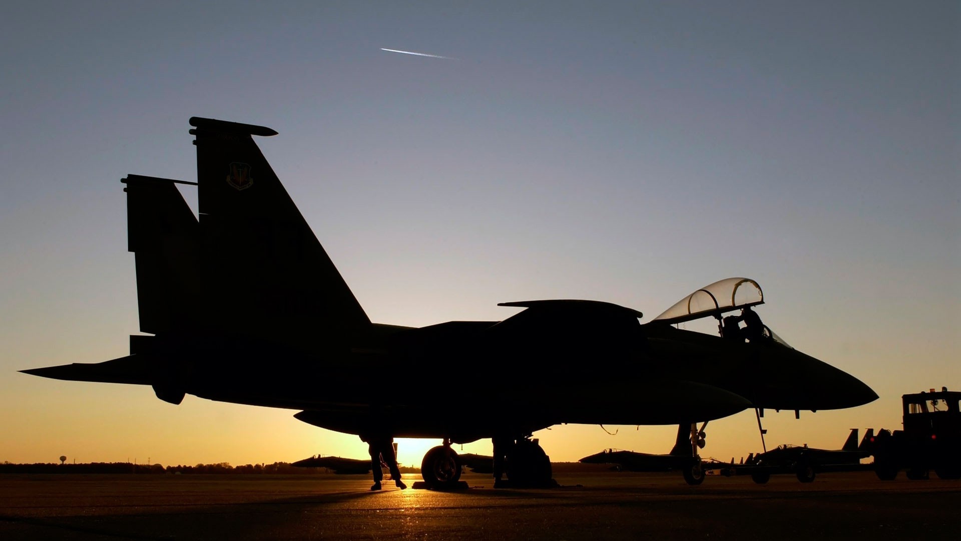 avión caza puesta del sol base militar f-15