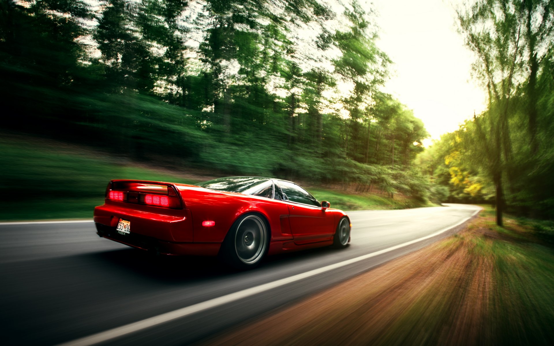 honda nsx red car in motion