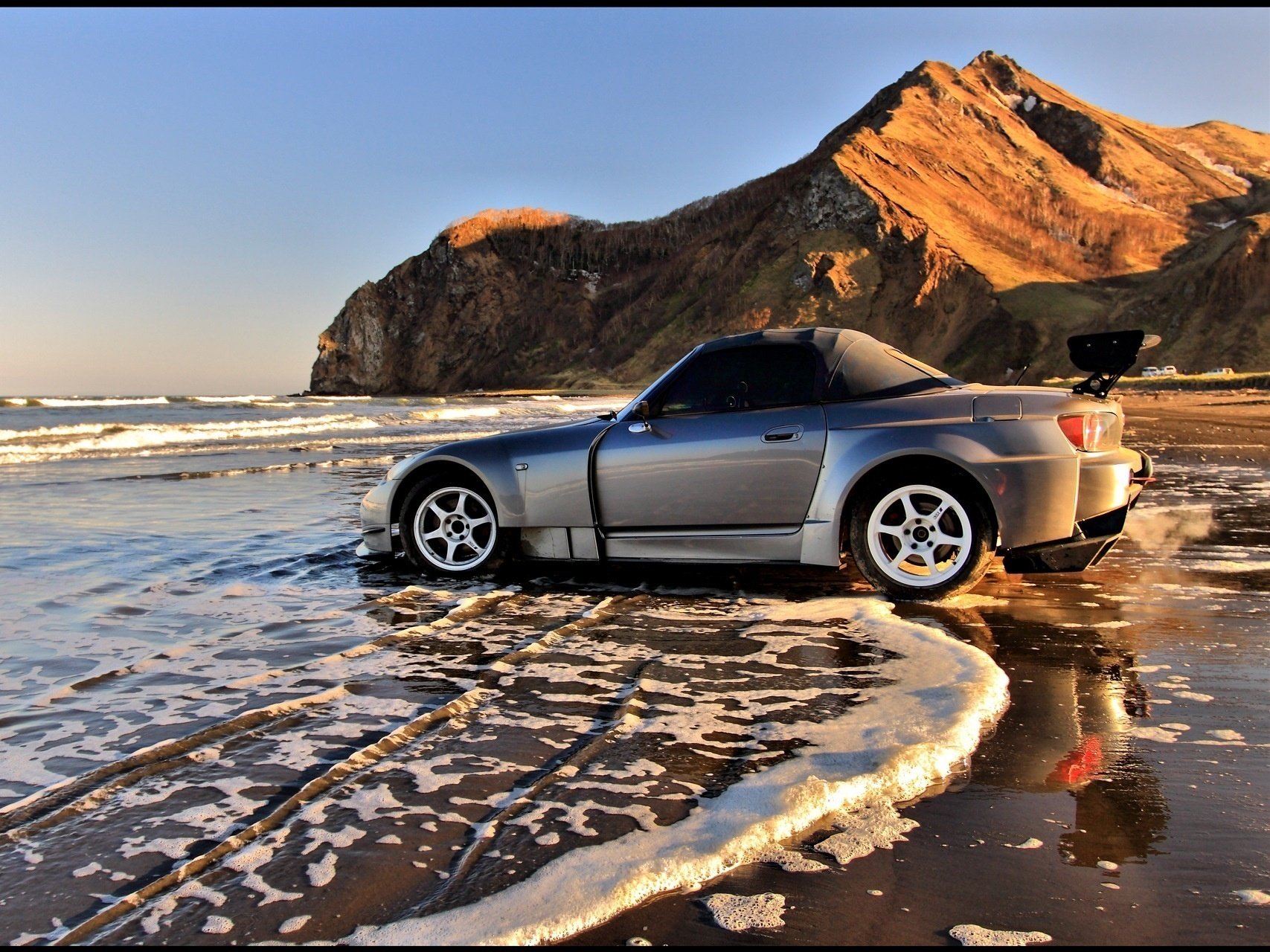 honda s2000 schiuma surf del mare in riva al mare rocce onde costa auto honda profilo montagne auto auto d argento trasporto veicoli mare tramonto montagna argento cerchi carriola