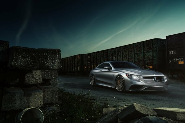 Beautiful mercedes-benz car on the train background