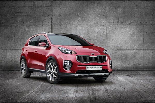 Red kia sportage in the studio