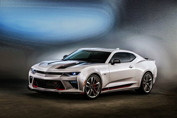 White Chevrolet camaro on a regular background