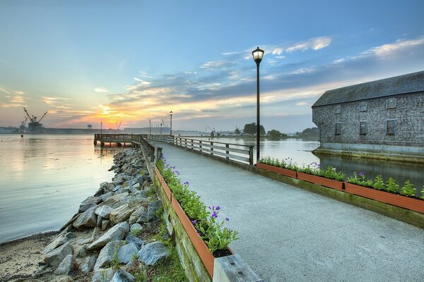 Sunset on the stone coast from the pier