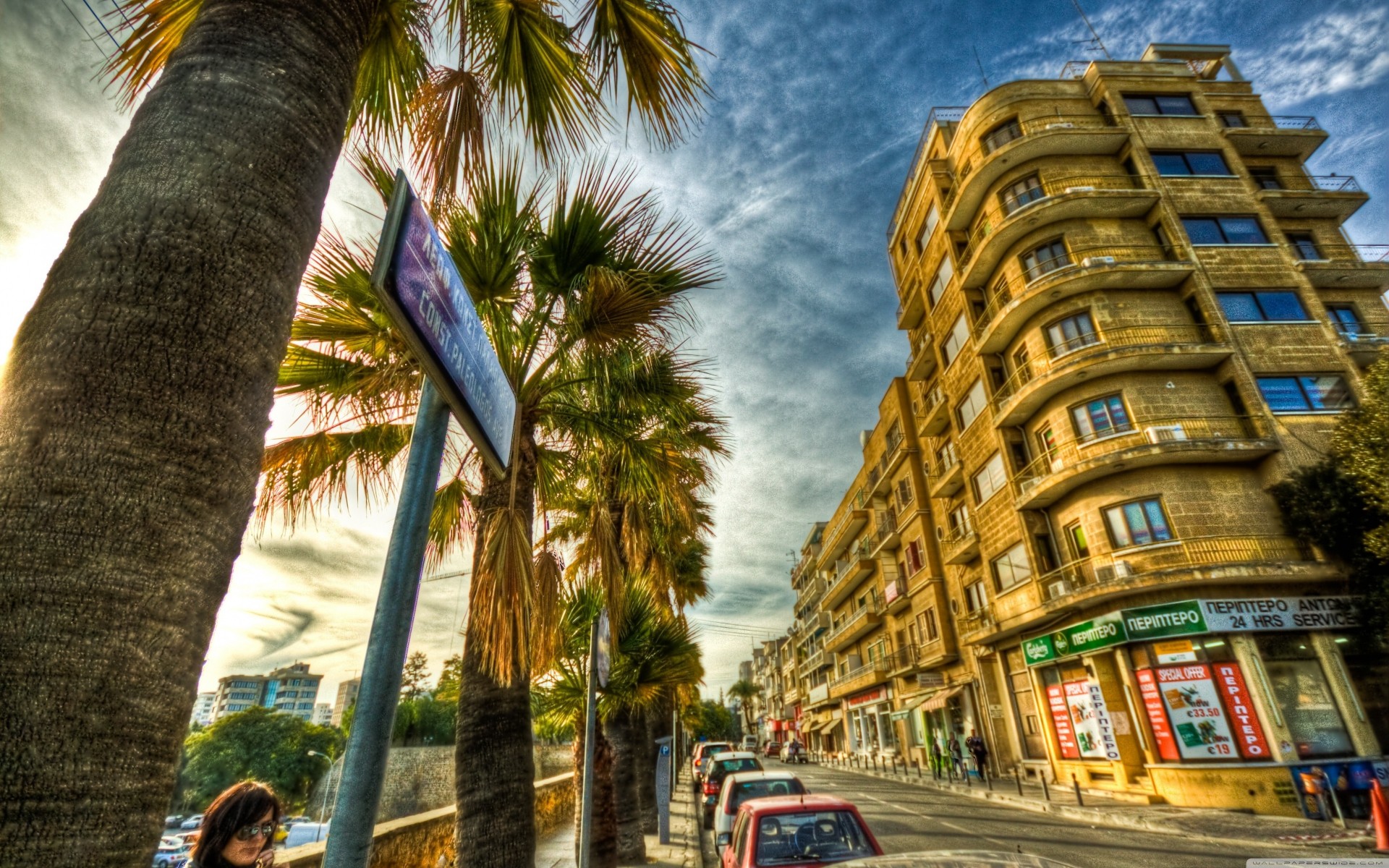 palme strada cielo blu automobili grecia