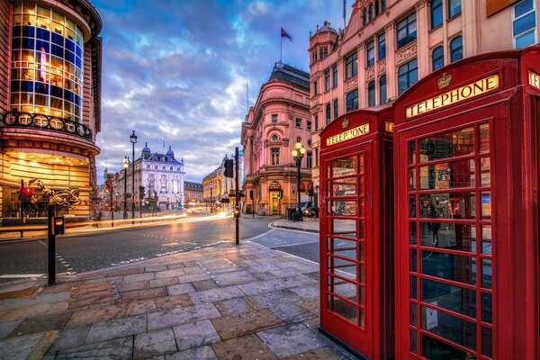 London. Red telephone booths. Journeys