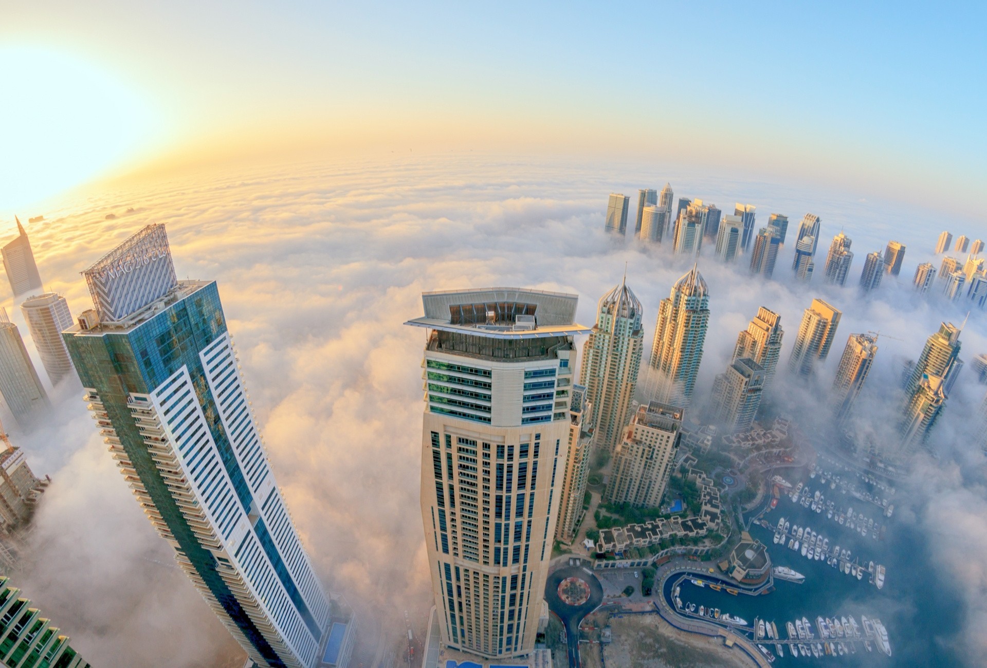 fog dubai skyscraper views town