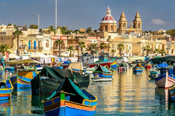 Colorful boats float on the water