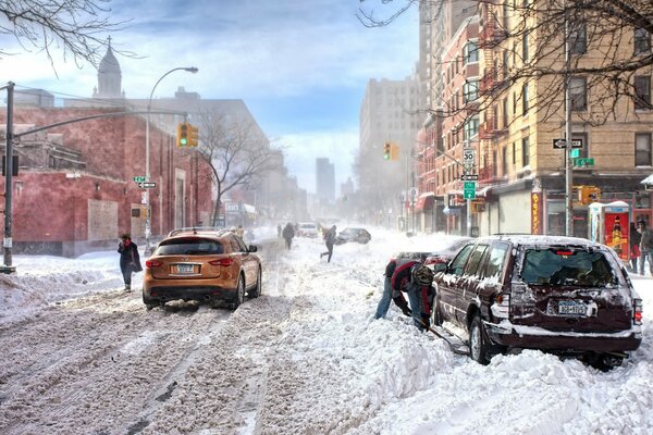 Dark car stuck in a snowdrift