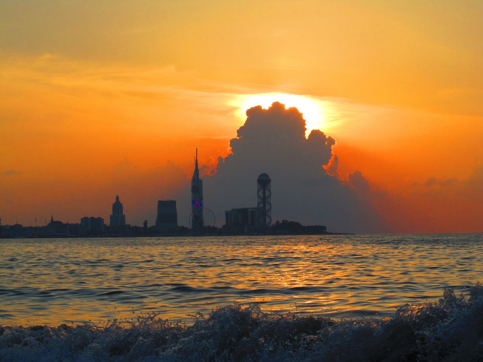 un sunset coast beach town night sea