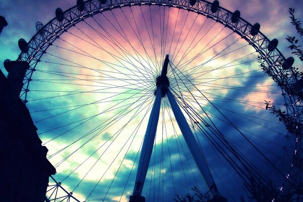 Ferris wheel on the background of the evening sky