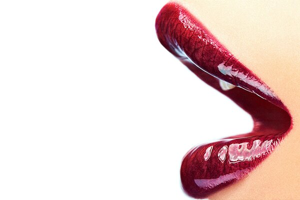 Glossy lipstick the color of ripe cherries