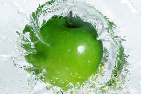 Green apple in the water