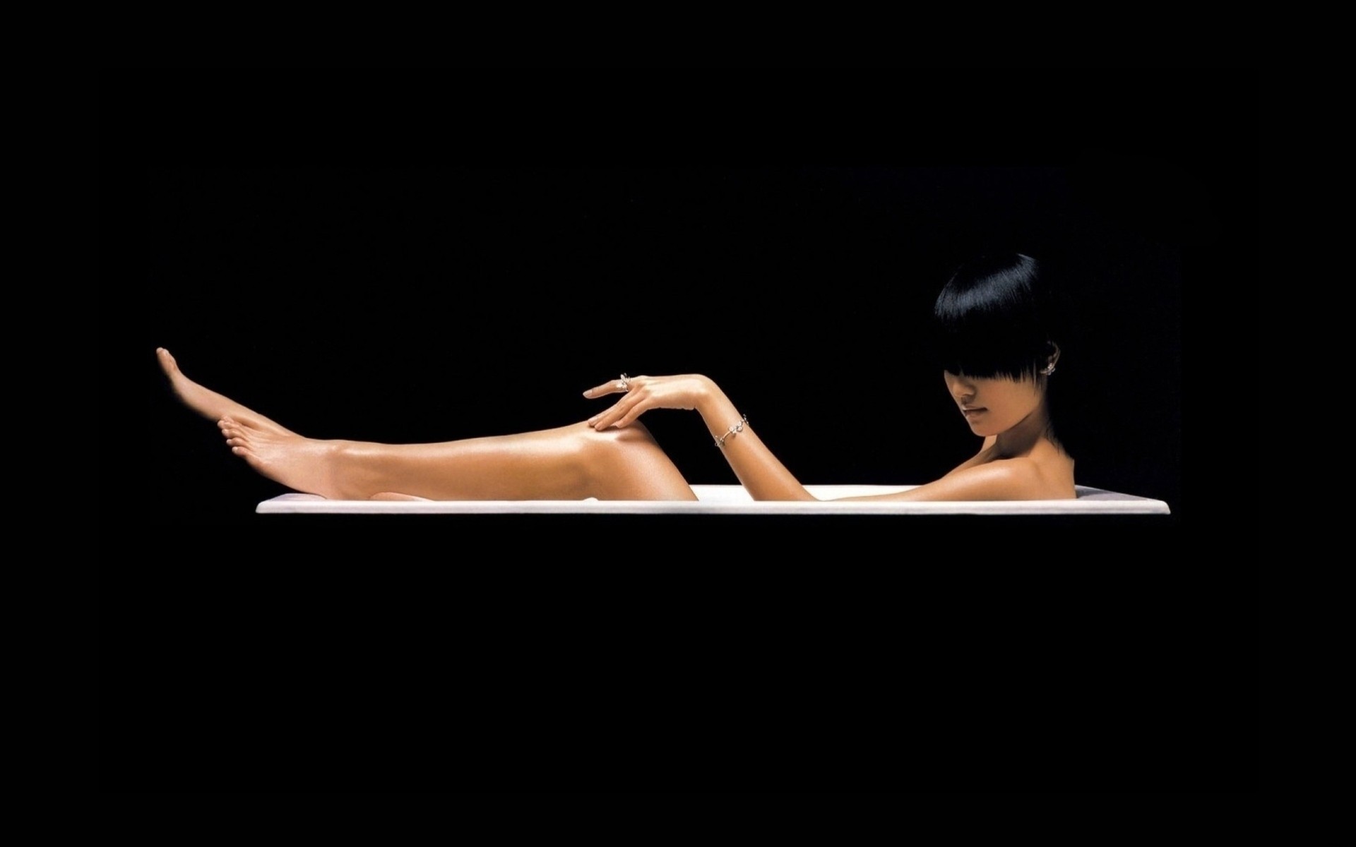 black background girl bath