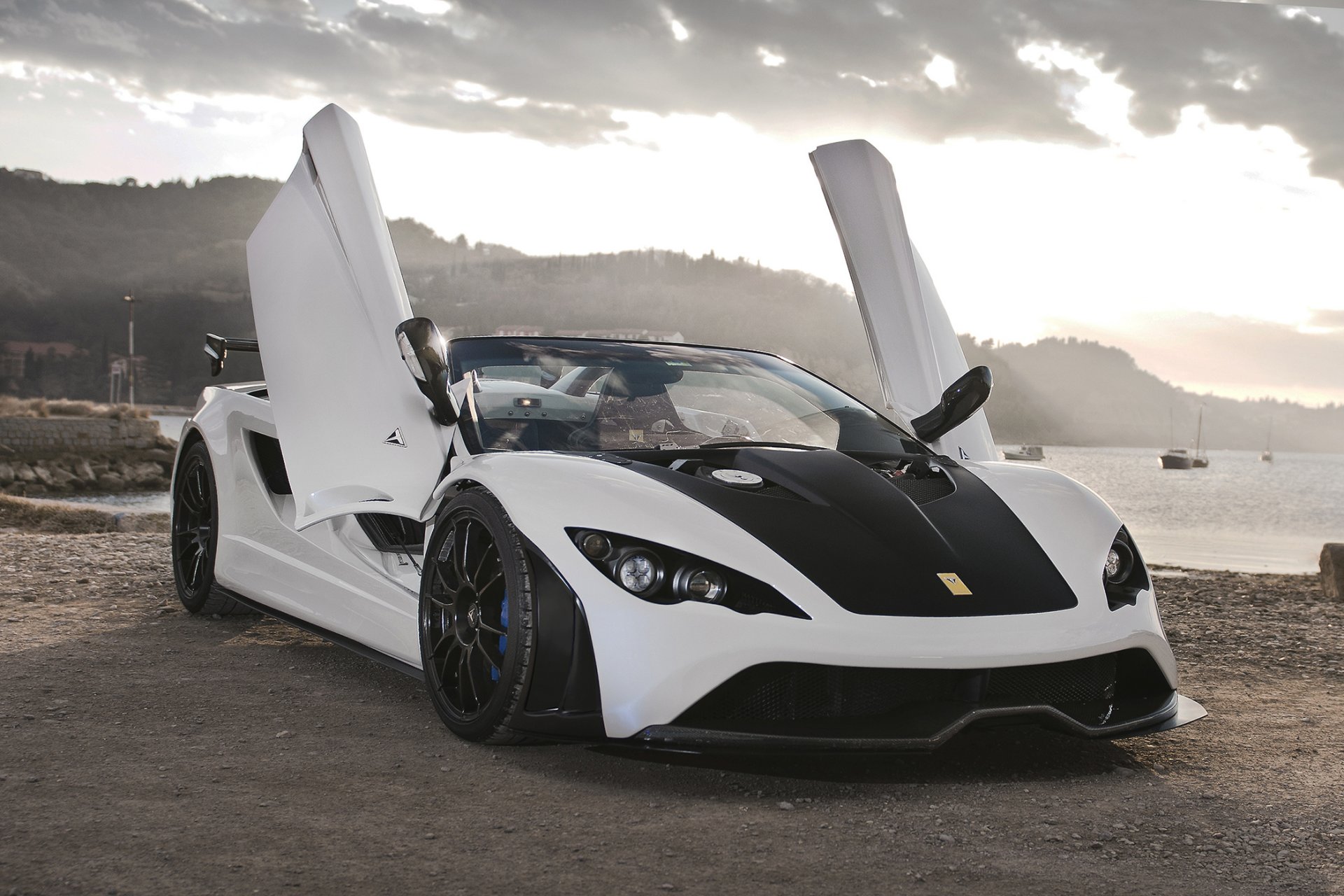 tushek renovatio t500 supercar white beach mountains water boat