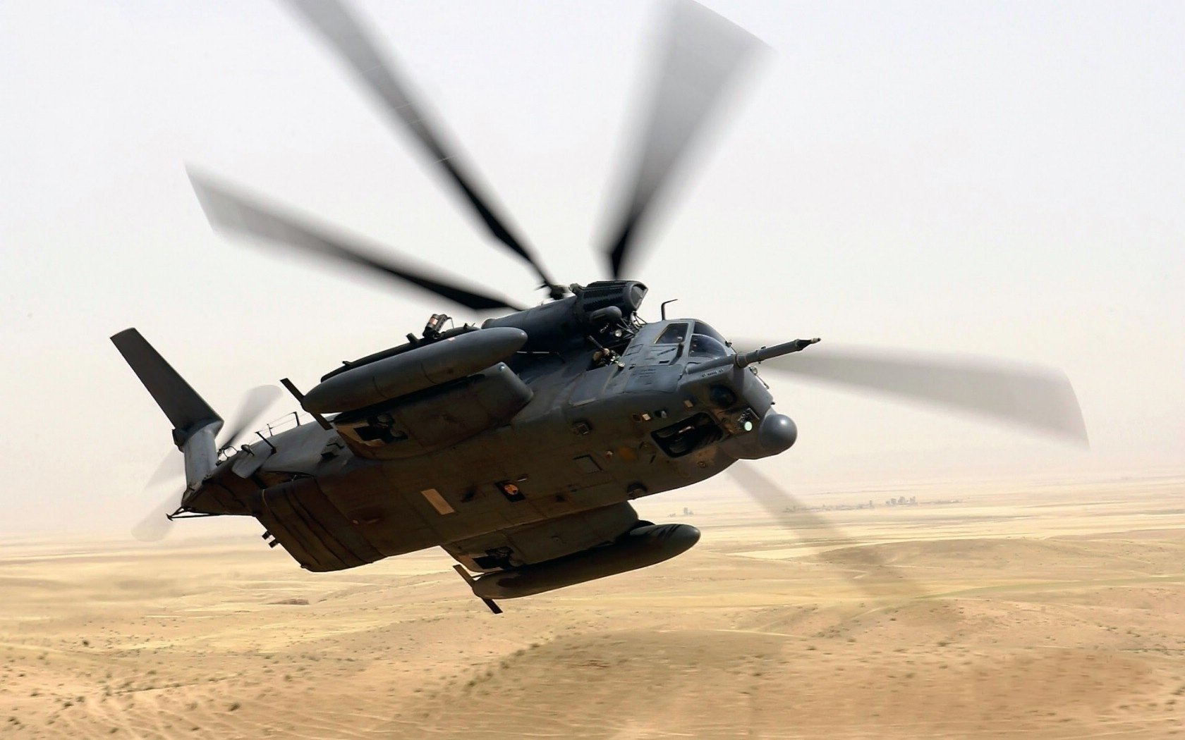 helicopter desert flight turn turn screw heavy black military equipment military aviation air transport air transport