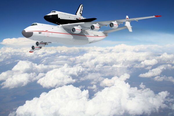 A white plane on a background of white clouds