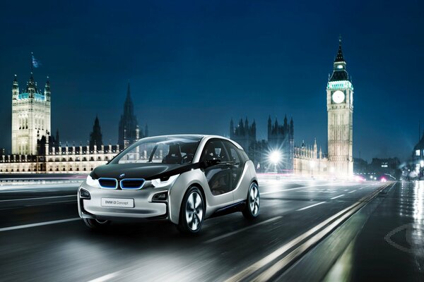 A car rushes through London at night