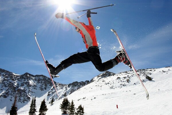 Man s ski jump in the mountains