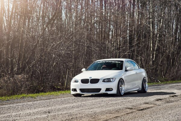 White BMW E92 on alloy wheels