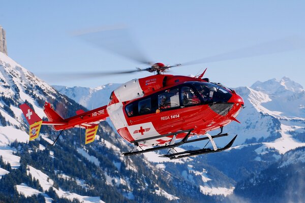 BK 117 - c2 ec - 145 helicopter in the mountains of Switzerland