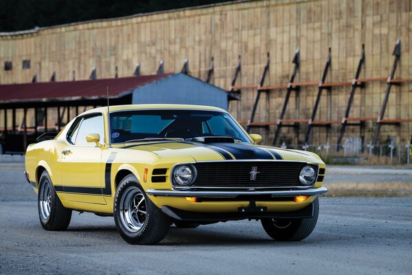 Yellow Ford Mustang on the playground