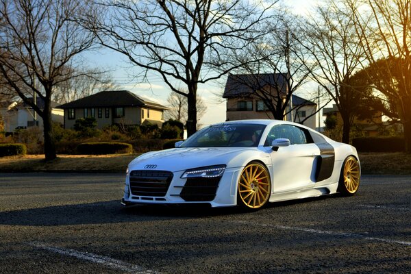 White Audi R8 with orange wheels