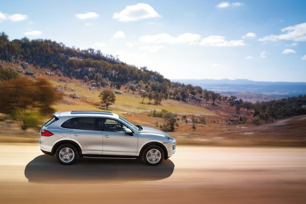 The Porsche Cayenne car is on the move