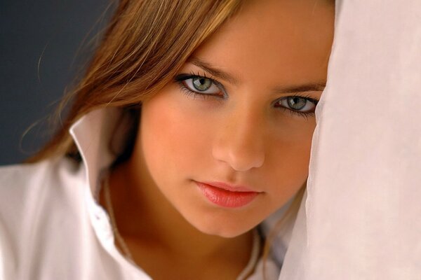 Piercing gaze of a brunette girl