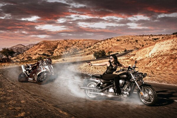 Bike racing. Brunette on a motorcycle