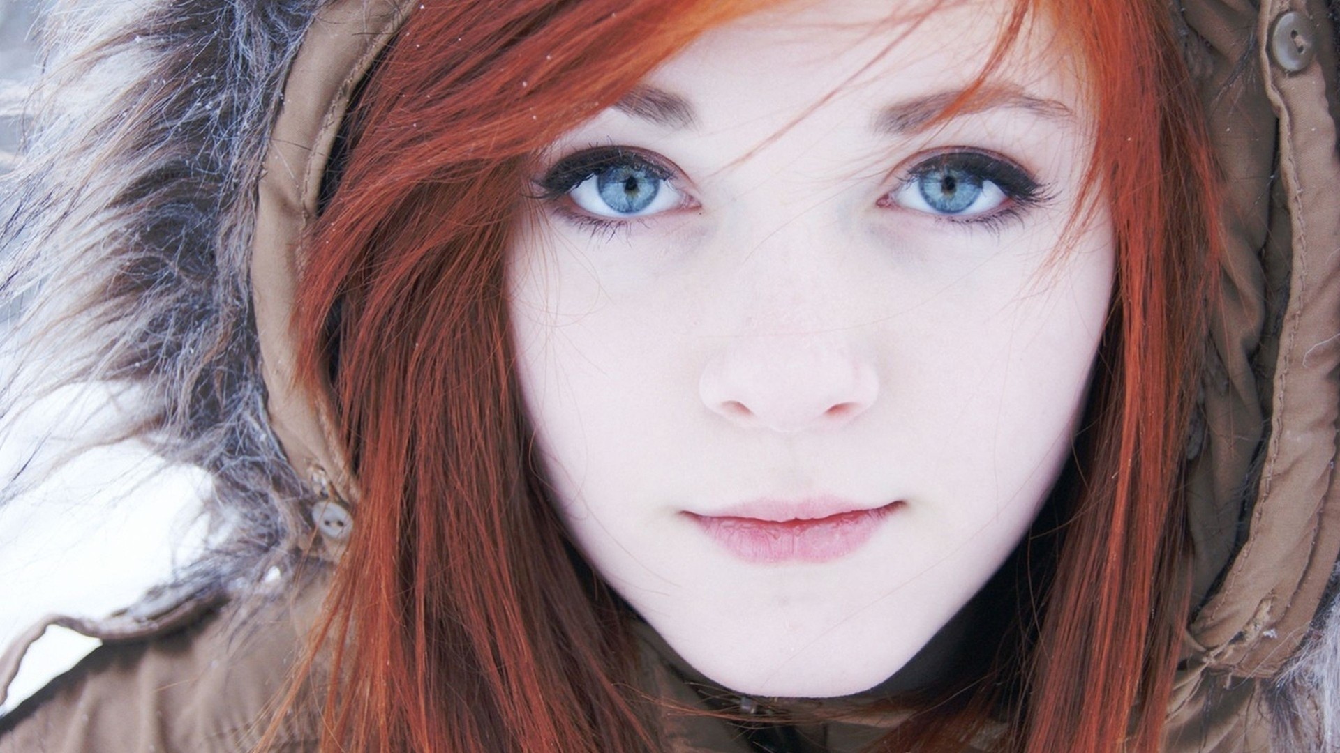 a woman girl red grey close up face