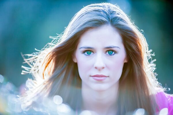 Green-eyed girl with developing hair