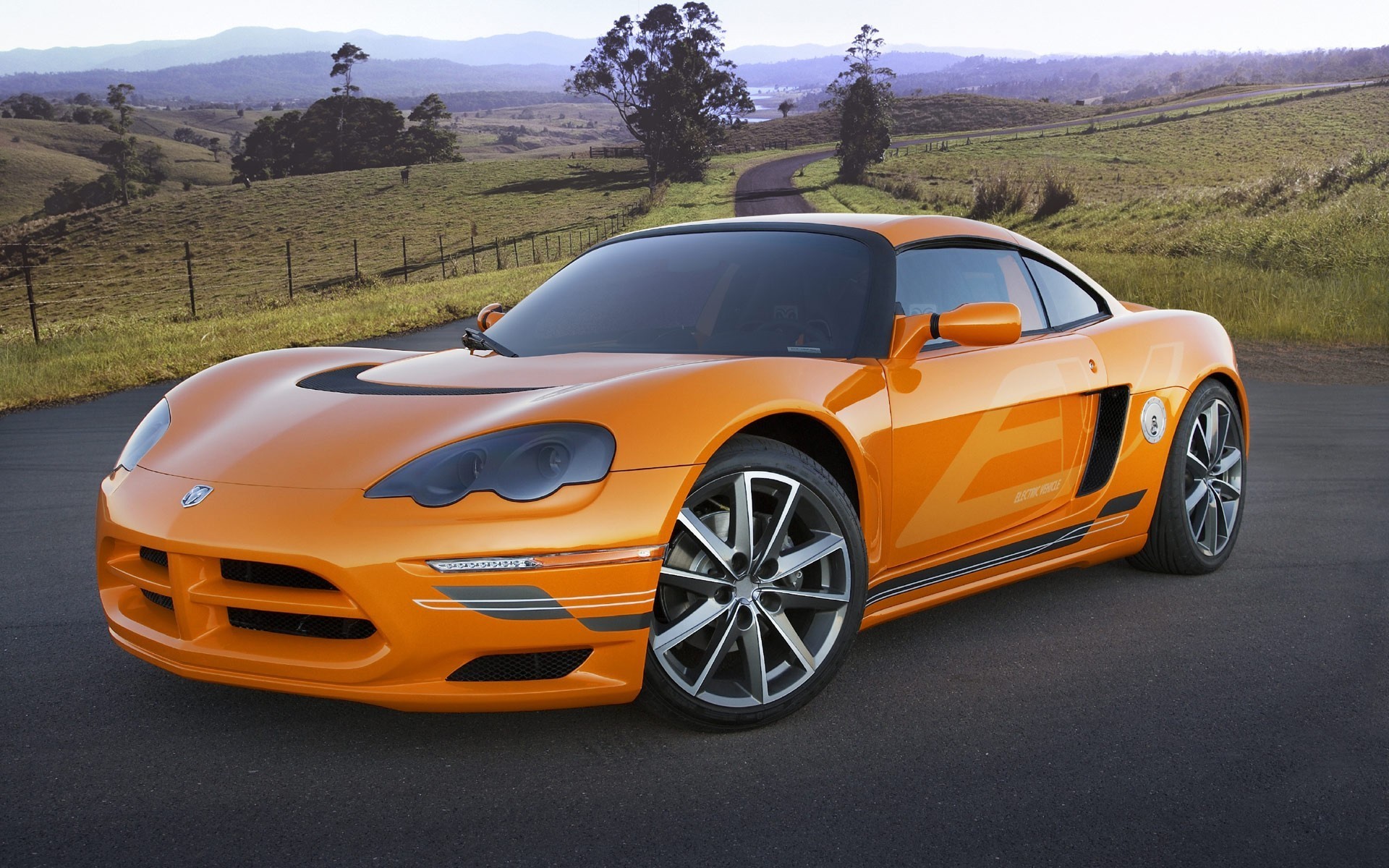 dodge orange sports car road