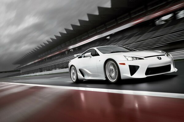 White lexus lfa racing at speed