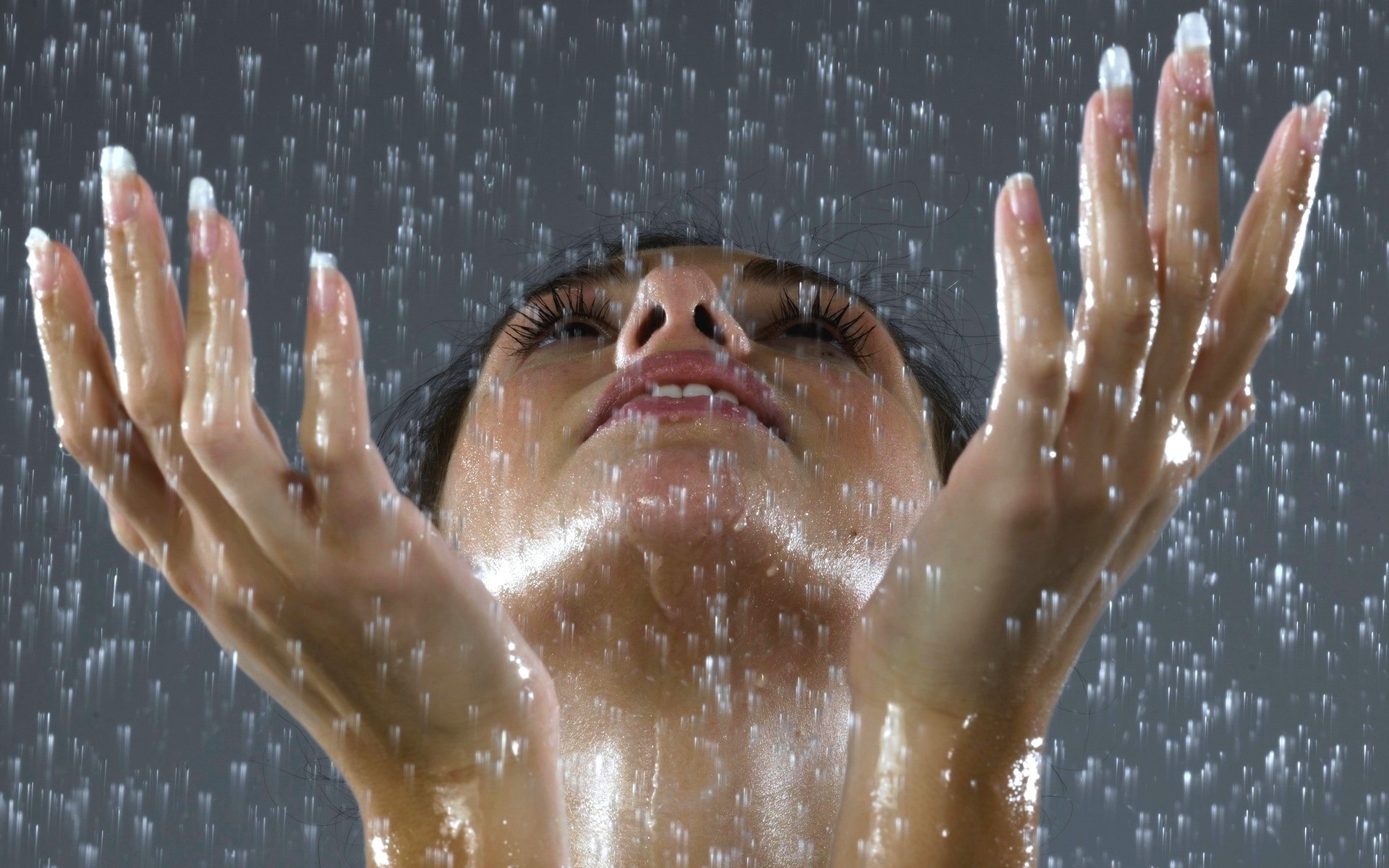 a woman girl brunette rain close up grey face