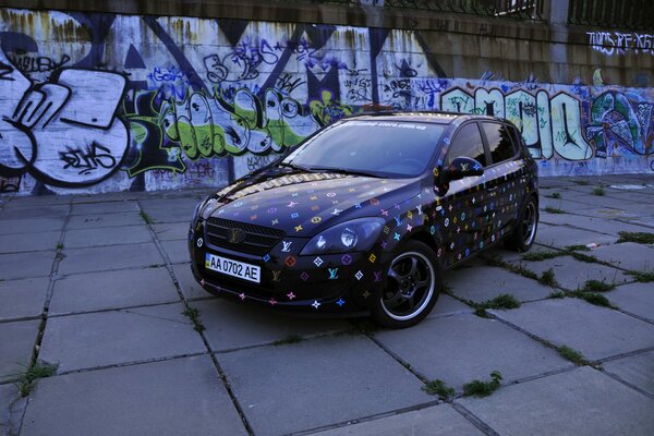 Underground kia sid 4 in a place with graffiti