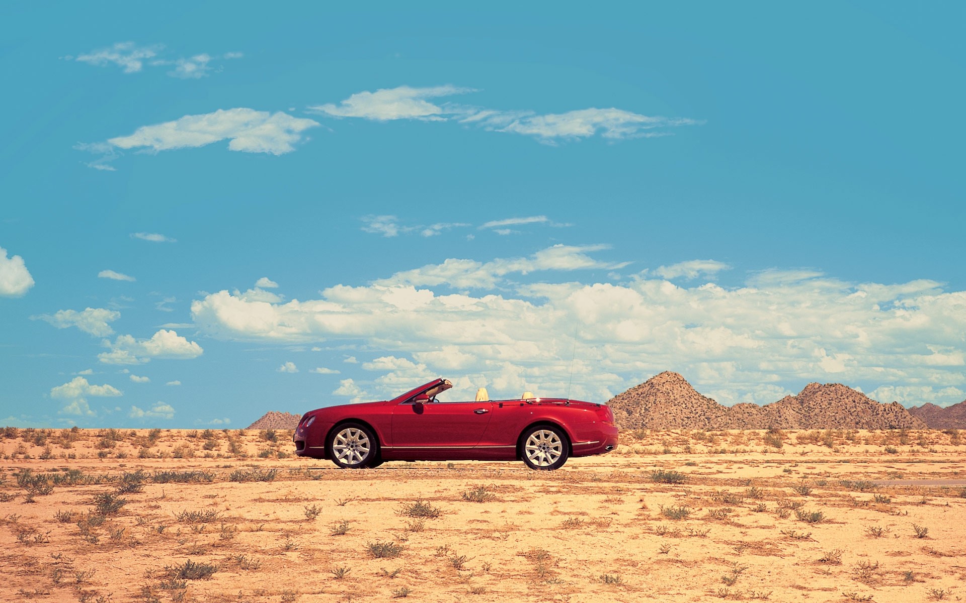 bentley continental gtc cielo terra nuvole