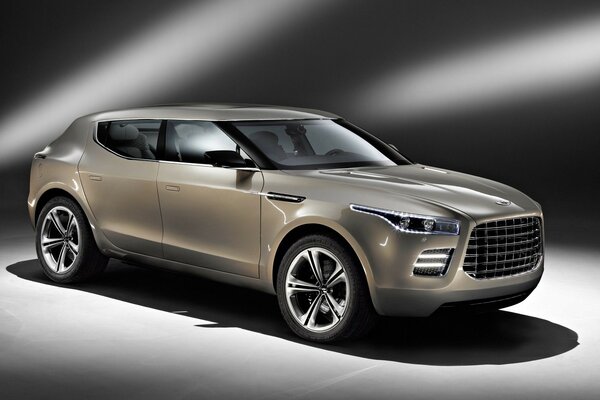 Aston Martin Lagonda concept sous soffites lumineux sur fond gris