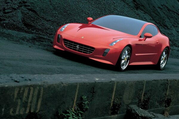 Ferrari rouge Monte sur un terrain sombre