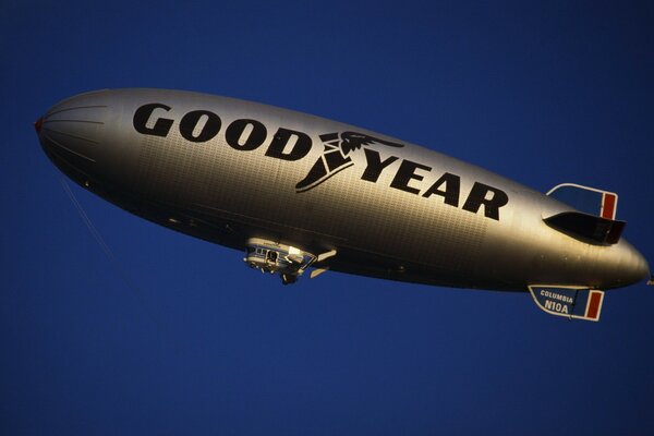 An airship flying in the blue sky