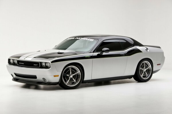 Mirrored dodge challenger on a gray background