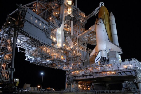 Cosmodrome shuttle night view from the bottom movement of the mash