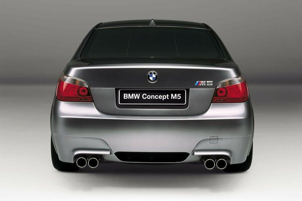 Bmw m5 with a roomy trunk and 4 exhaust pipes