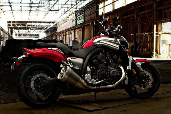 Photo of a motorcycle in a gray garage