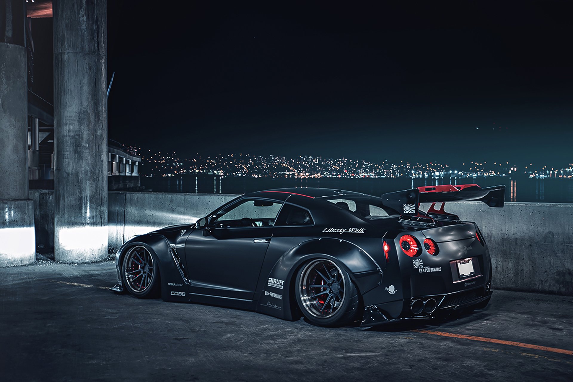 nissan gt-r r35 libertad mate negro bajo japón deporte coche trasero nigth ciudad