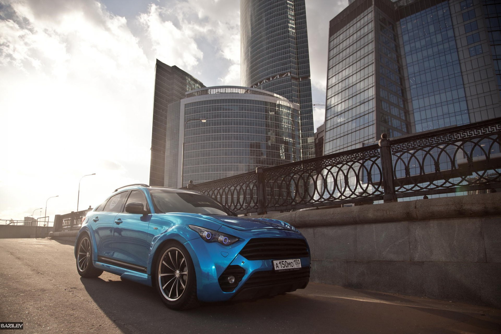 alex bazilev photographer infiniti fx50 blue drives sunset