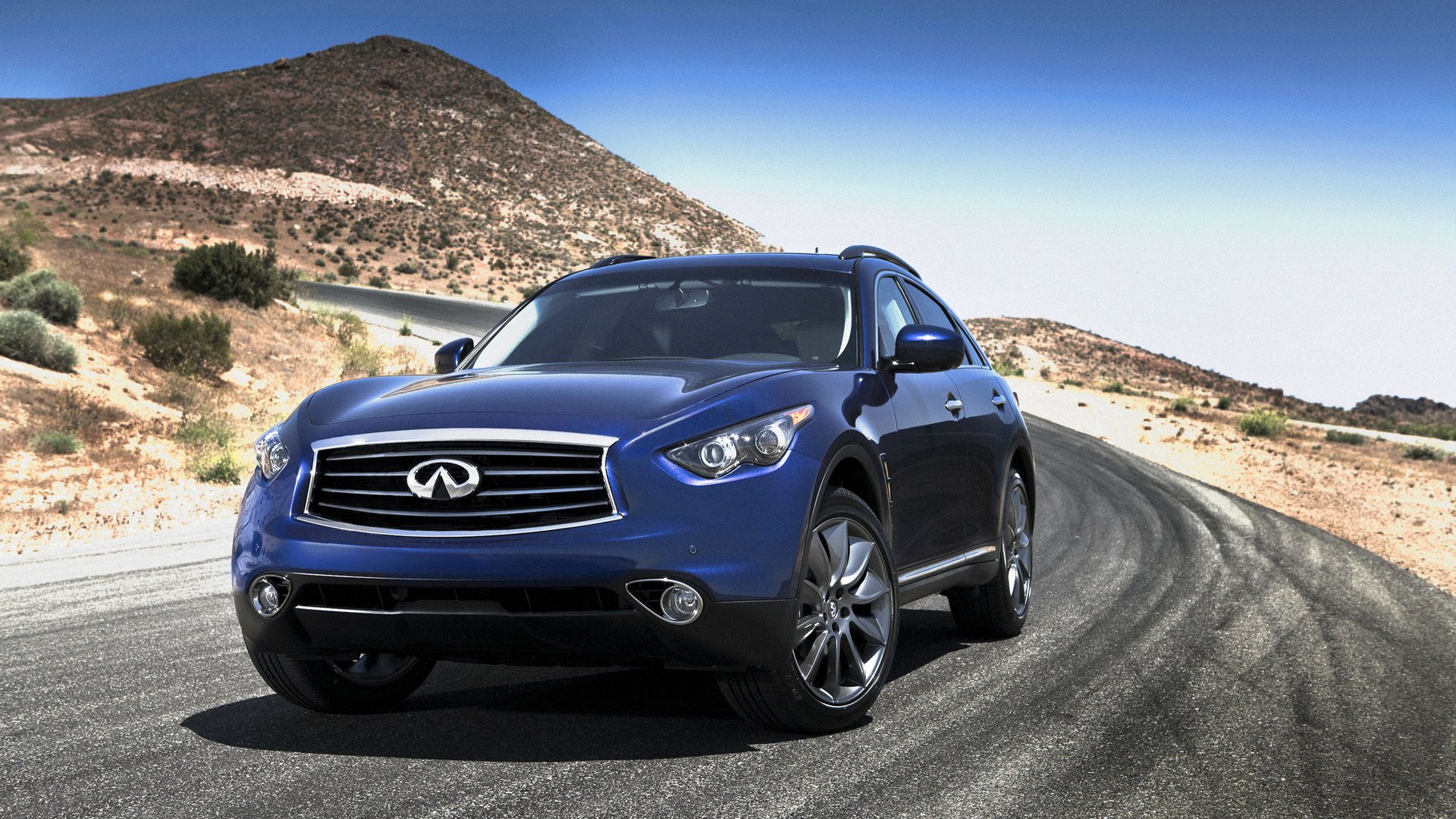 infiniti fx35 suv sport utility vehicle wheel hatchback light emblem landscape mountain road